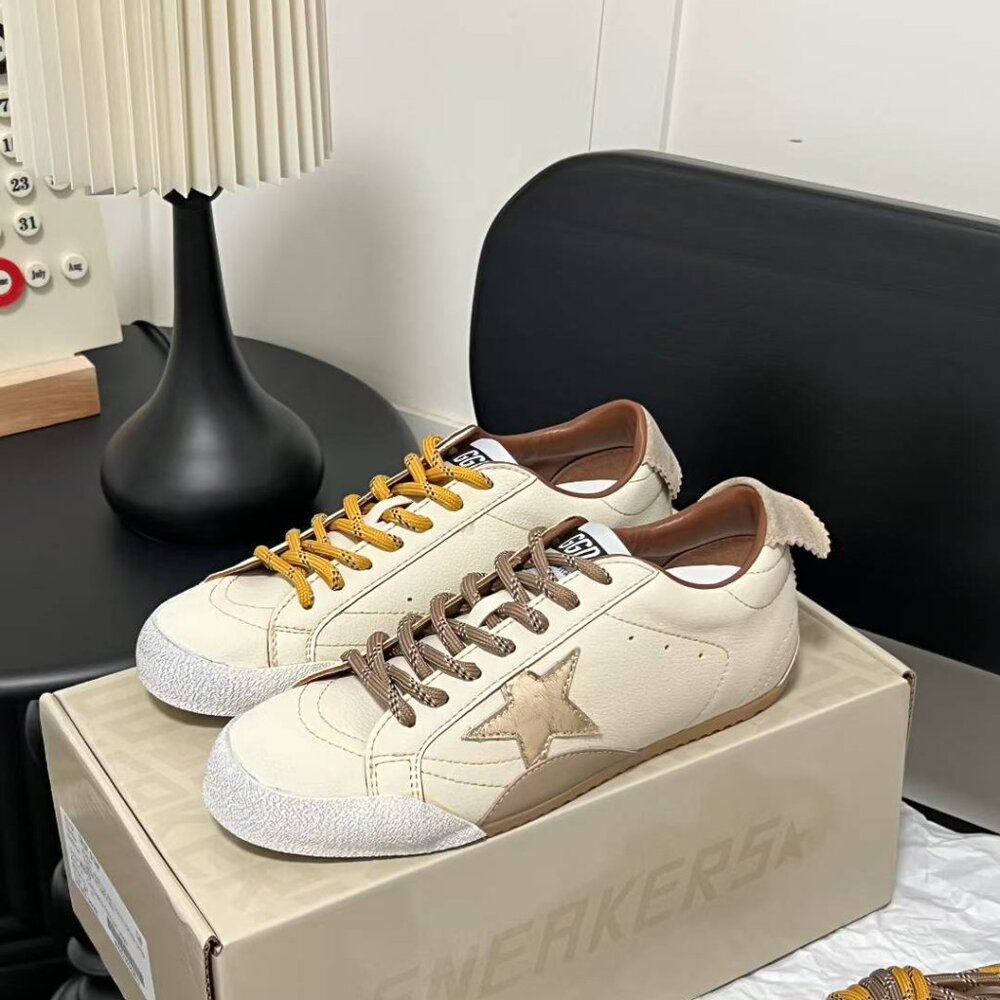 Golden Goose White and Gold Sneakers